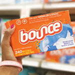 Hand Holding Bounce Dryer Sheets Laundry Fabric Softener