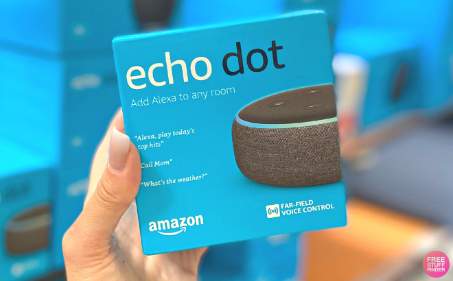 Hand Holding Echo Dot Smart Speaker