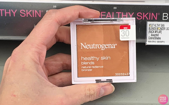 Hand Holding Neutrogena Bronzer