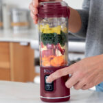 Hand Holding Ninja Blast 18 oz Portable Rechargeable Blender