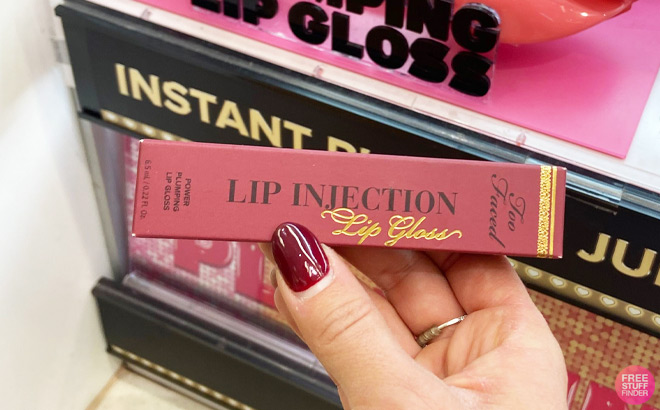 Hand Holding Too Faced Lip Injection Power Plumping Hydrating Lip Gloss