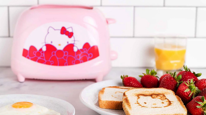 Hello Kitty Toaster with Toast and Egg on a Table