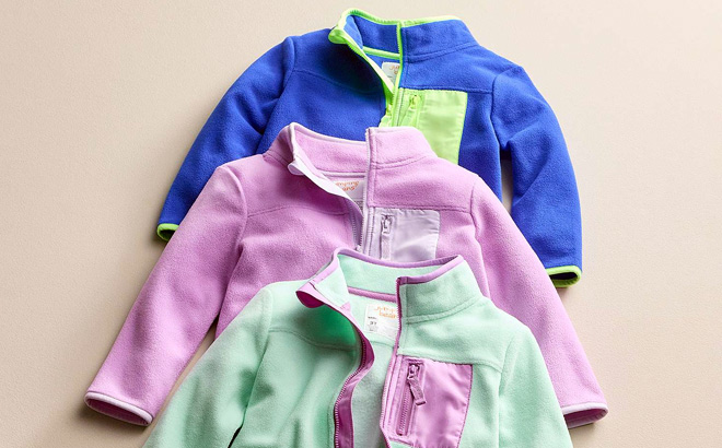 Jumping Beans Baby Toddler Fleece Jackets on The Ground