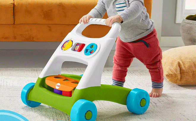 Kid Playing With Fisher Price Ultimate Infant Fundamentals Set