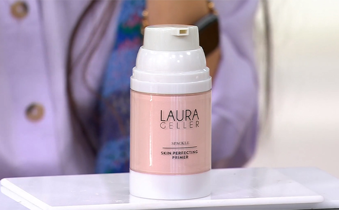 Laura Geller Super Size Ethereal Spackle Makeup Primer 4 Ounce Bottle on a Table