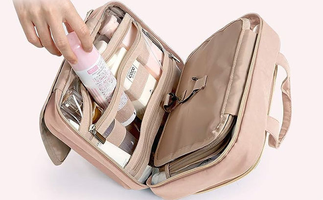 Makeup Organizer Travel Bag on a Pink Background