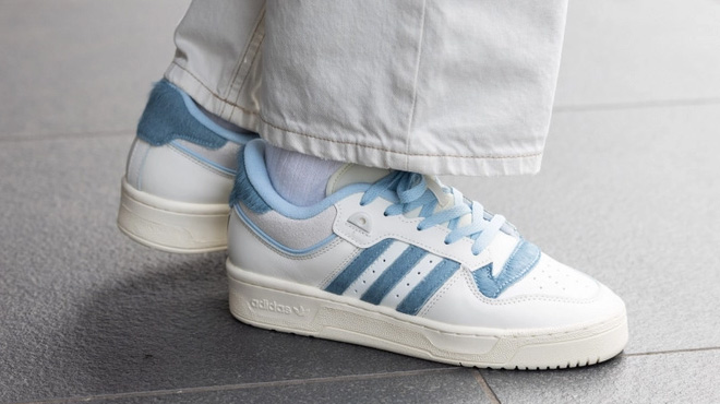 Man Wearing Adidas Originals Rivalry Low 86 Basketball Shoes