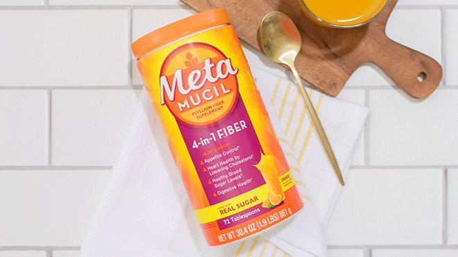 Metamucil Fiber Supplement with a spoon