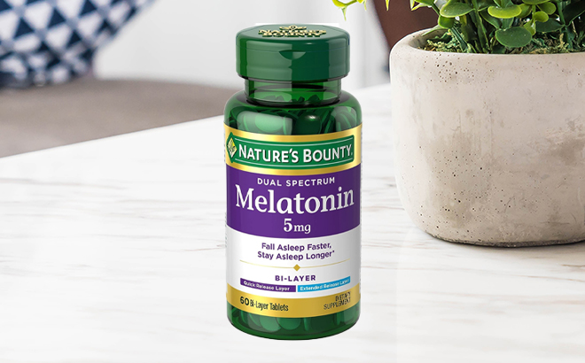 Natures Bounty Melatonin 5mg Dual Spectrum 60 Count Tablets on a Table