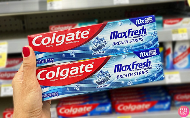 Person Holding Colgate Max Fresh Whitening Toothpaste