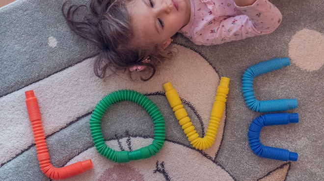 Pop Tubes Sensory Toys Shaped as Letters Spelled Love