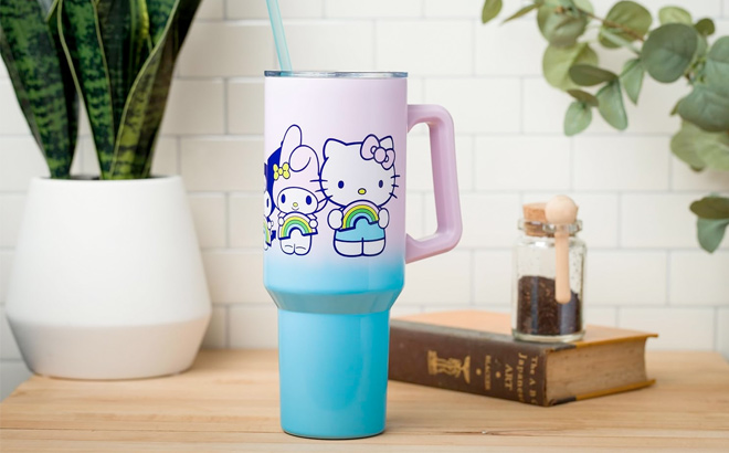 Silver Buffalo Sanrio Hello Kitty and Friends Featuring My Melody Kuromi and Pompompurin Rainbow Ombre Stainless Steel Tumbler w Handle