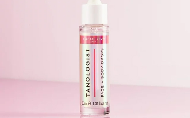 Tanologist Face and Body Self Tan Drops Light Bronzing Drops on a Pink Background