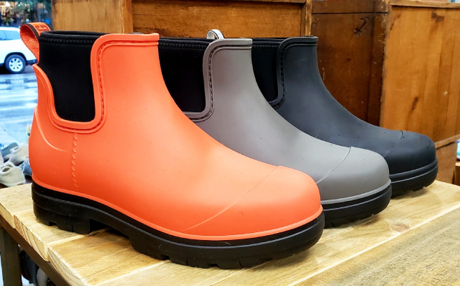 UGG Womens Droplet Rain Boots on a Wooden Table