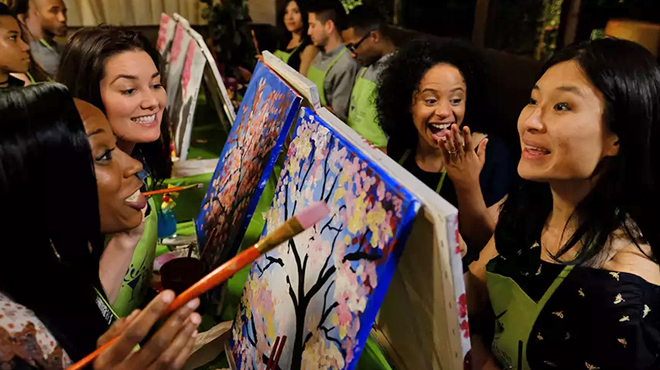 Women Painting in a Paint Sip Class by Paint Nite