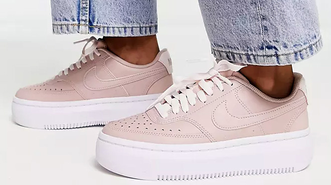 Women Wearing Nike Court Vintage Sneakers in Pink and White