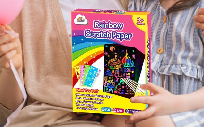 a Girl Holding a Scratch Paper 60 Piece Art Set