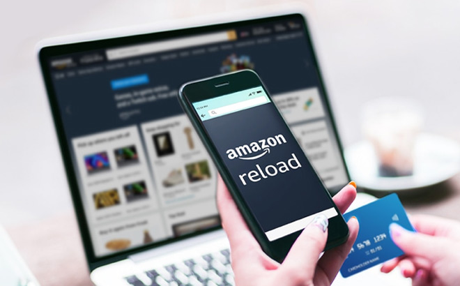 a Hand Holding Phone with Amazon Reload Banner