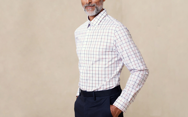 a Man Wearing a Banana Republic Factory Mens Athletic Fit Dress Shirt