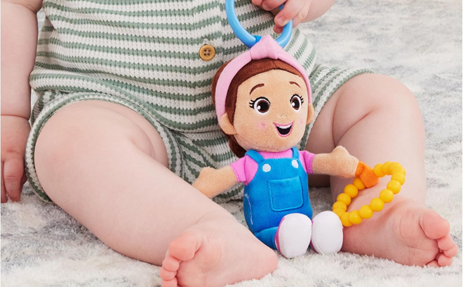 A Baby Playing with the Ms Rachel Sensory Take Along Toy