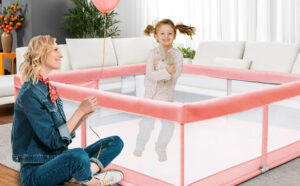 Baby Playpen 48 Shipped At Walmart Free Stuff Finder   A Kid Playing Inside A Baby Playpen In Pink Color 300x186 