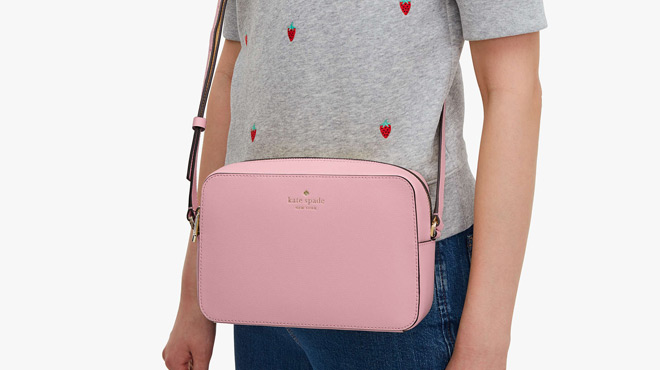 A Person Slinging a Kate Spade Harper Crossbody