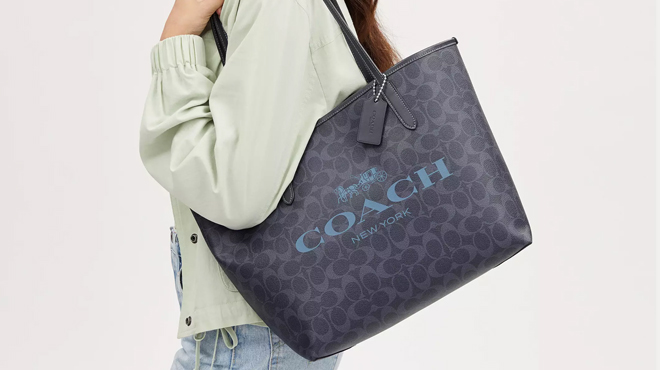 A Person Wearing Coach Tote Bag