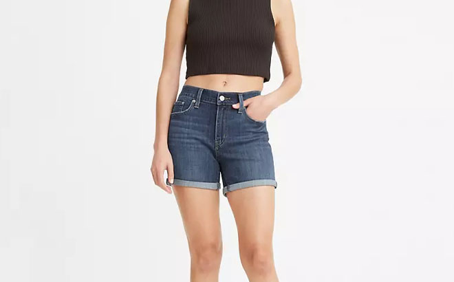 A Person Wearing Levis Mid Length Womens Shorts