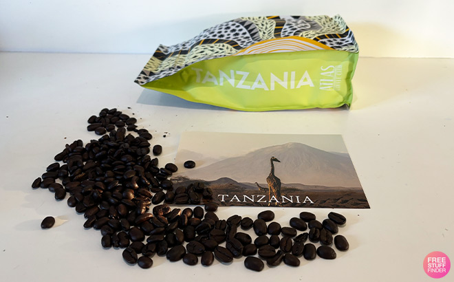 A Postcard Coffee Bag and Coffee Beans on a Tabletop