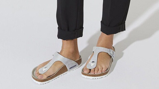 A Woman Wearing Birkenstock Gizeh Iridescent Thong Sandal