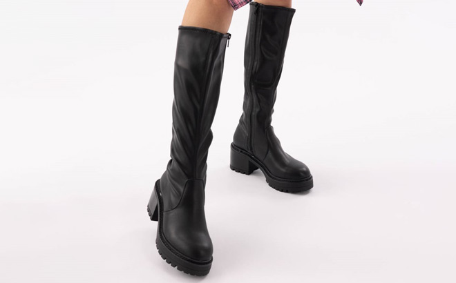 A Women Wearing Madden Girl Meadow Tall Boots