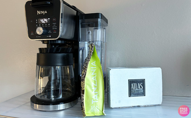 Atlas Coffee Bags next to Coffee Maker