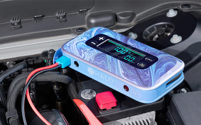 HALO Bolt Air Dynamic Display Air Compressor Jump Starter Charging Ports in Purple on a Car