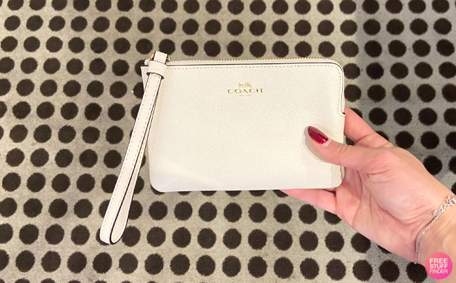 Hand Holding Coach Outlet Corner Zip Wristlet