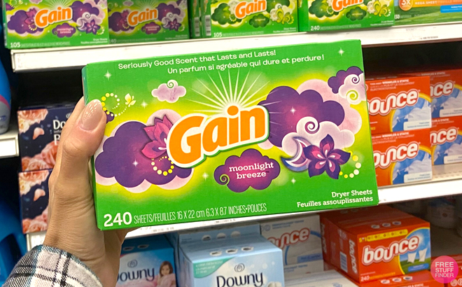 Hand Holding Gain 240 Count Dryer Sheets in Moonlight Breeze