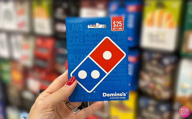 Hand Holding a 25 Dominos Gift Card