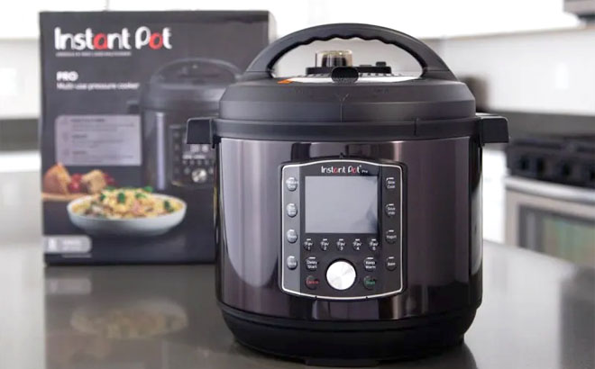 Instant Pot Pro 6 Quart 10 in 1 Pressure Cooker on a Table