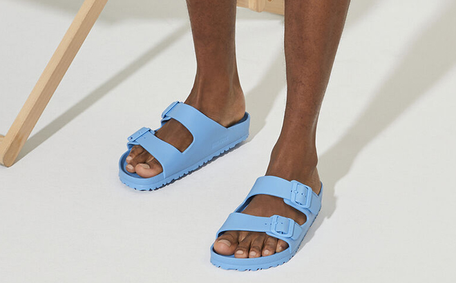 Man Wearing Birkenstock Arizona Eva Narrow Sandals in Sky Blue