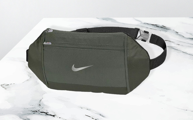 Nike Challenger Waist Pack in Olive Color on the Table