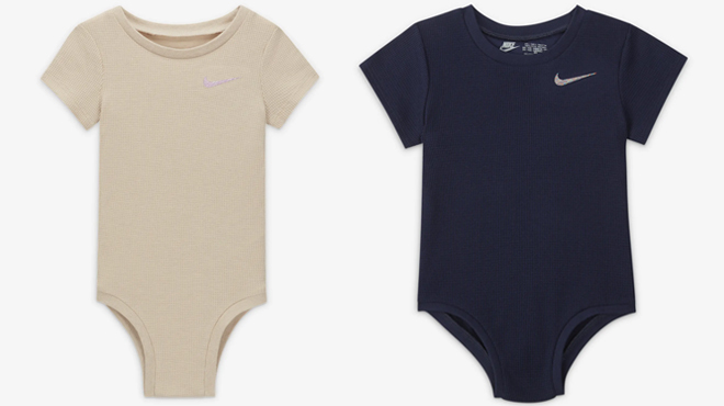 Nike ReadySet Baby Bodysuits in Sanddrift on the Left and Midnight Navy on the Right