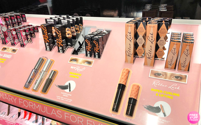 Several Benefit Cosmetics Mascaras on a Product Display