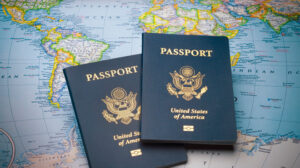 Two US Passports on a World Map