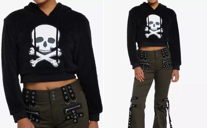 Woman is Wearing Social Collision Skull Crossbones Girls Fuzzy Crop Hoodie