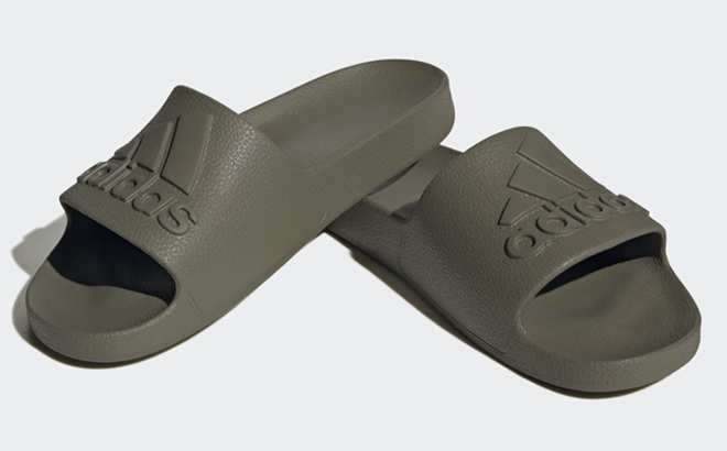 a Pair of Adidas Adilette Aqua Slides