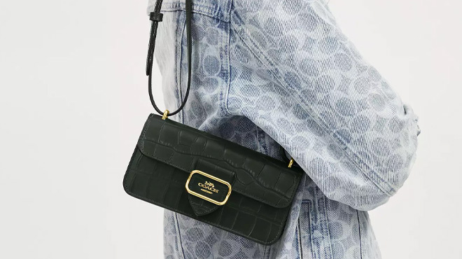 a Person Holding Coach Outlet Morgan Crossbody