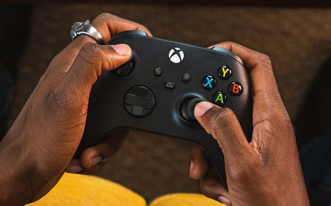 a Peson Using Microsoft Xbox Wireless Controller