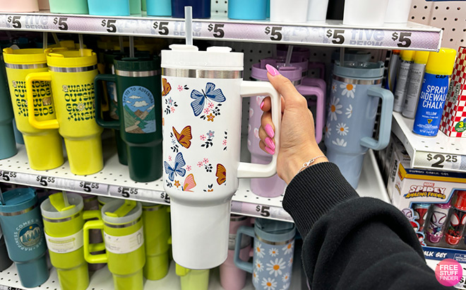 A Person Holding 40oz Pattern Hydraquench Tumbler With Handle in Butterfly Style