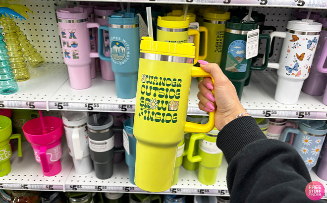 A Person Holding 40oz Pattern Hydraquench Tumbler With Handle in Wander Outside Style
