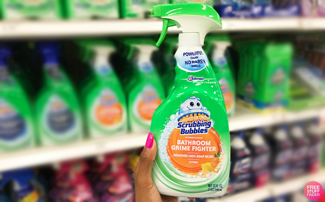 A Person Holding Scrubbing Bubbles Disinfectant Bathroom Grime Fighter Spray