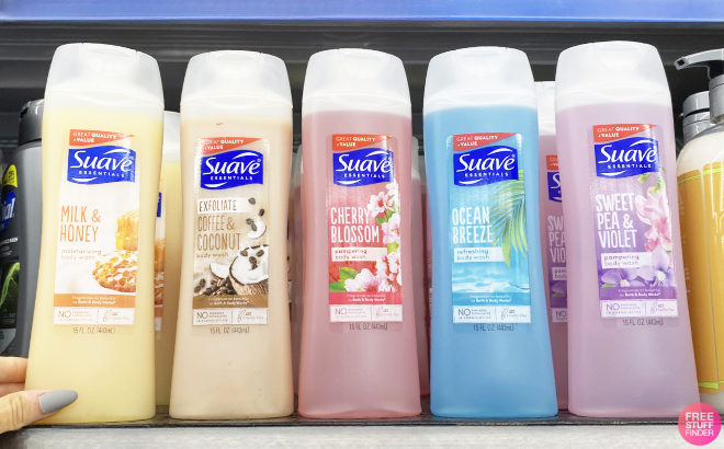 A Person Holding a Bottle of Suave Milk Honey Moisturizing Body Wash on Shelf